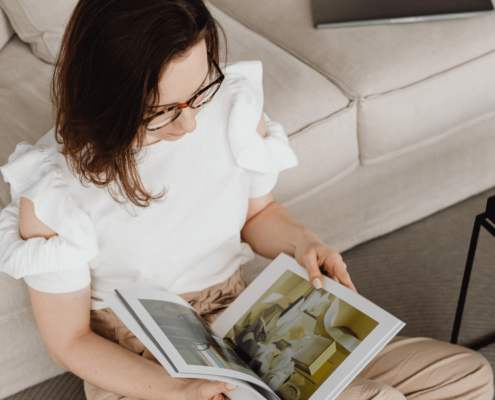 Female reading a catalogue