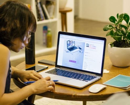 Female looking at product images on screen